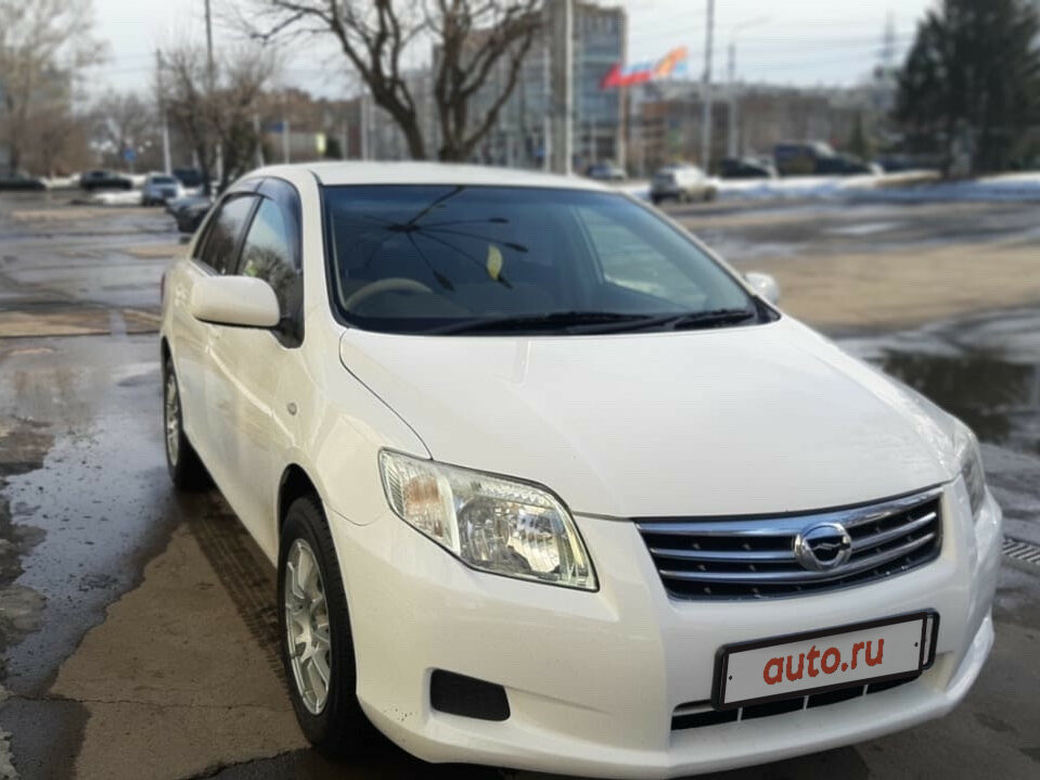 Королла аксио 2010. Toyota Axio 2010. Тойота Аксио 140 кузов. Тойота Аксио 2008. Сузуки Аксио 100.